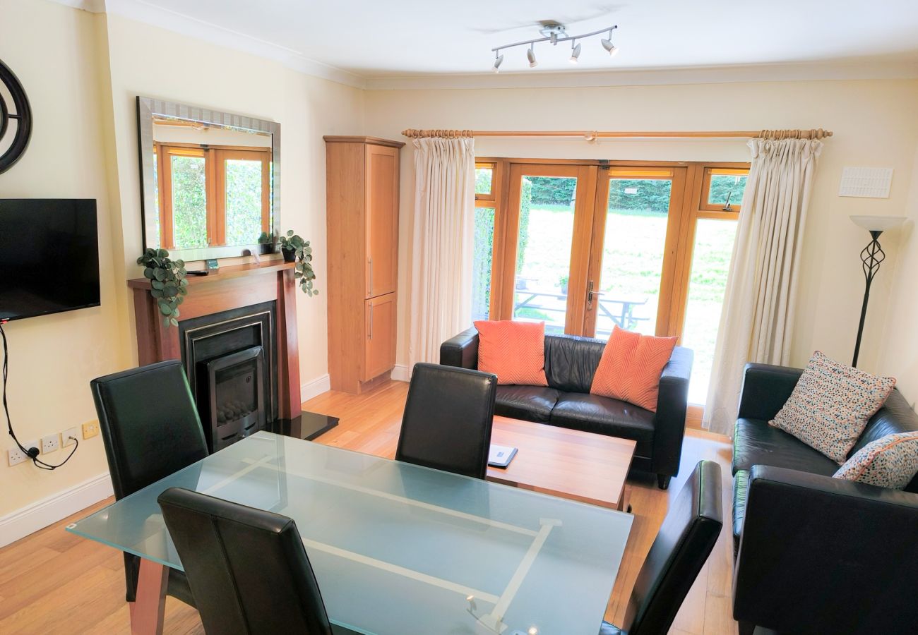 Heyward Mews Holiday Homes,. Open plan dining area, bright, large windows, comfortable seating. 