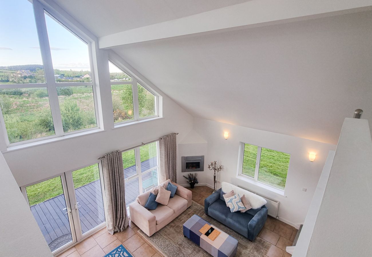 Riverrun Holiday Home No 15. Mezzanine views with large windows throughout. Bright airy home.