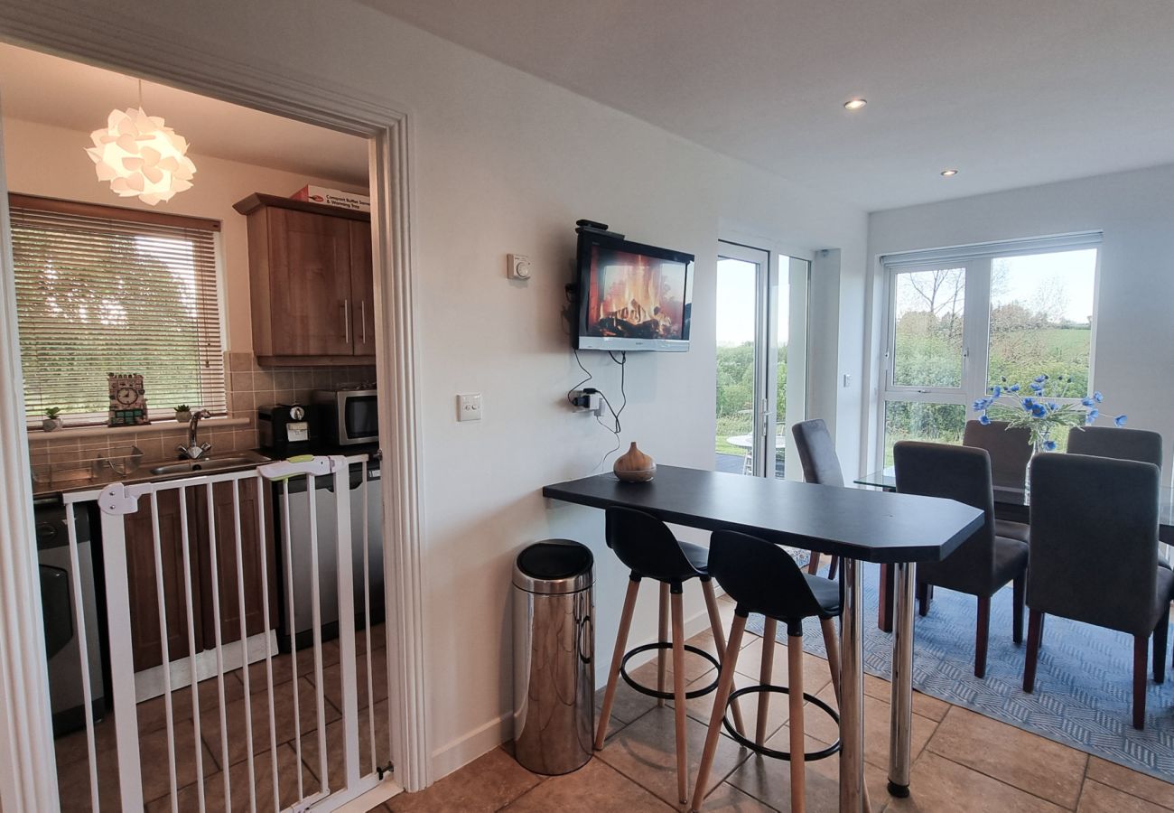 Riverrun Holiday Home No 15.  Child safety gate from lounge to kitchen.