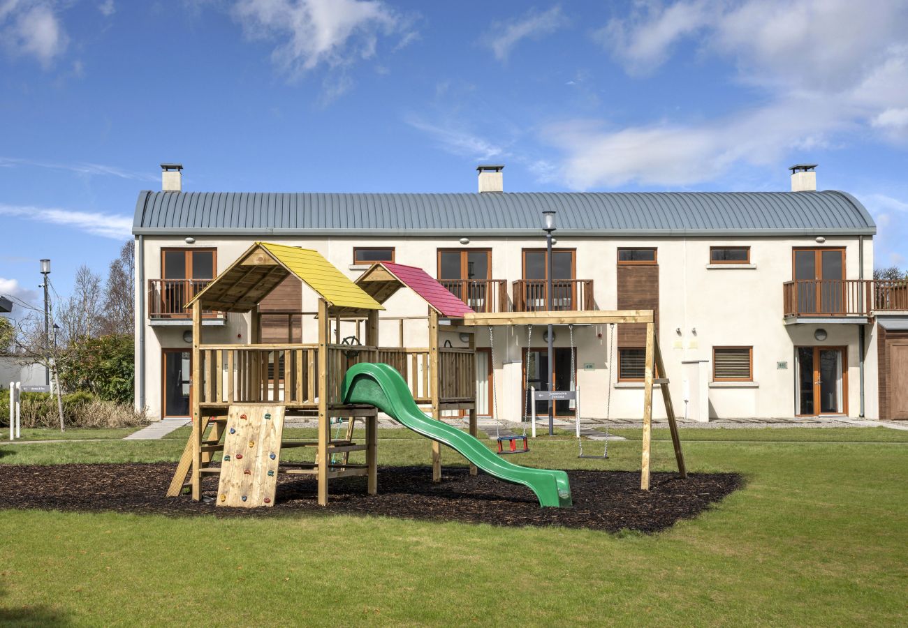 Johnstown Estate Holiday Lodges. Co Meath. Playground, green, slides. 