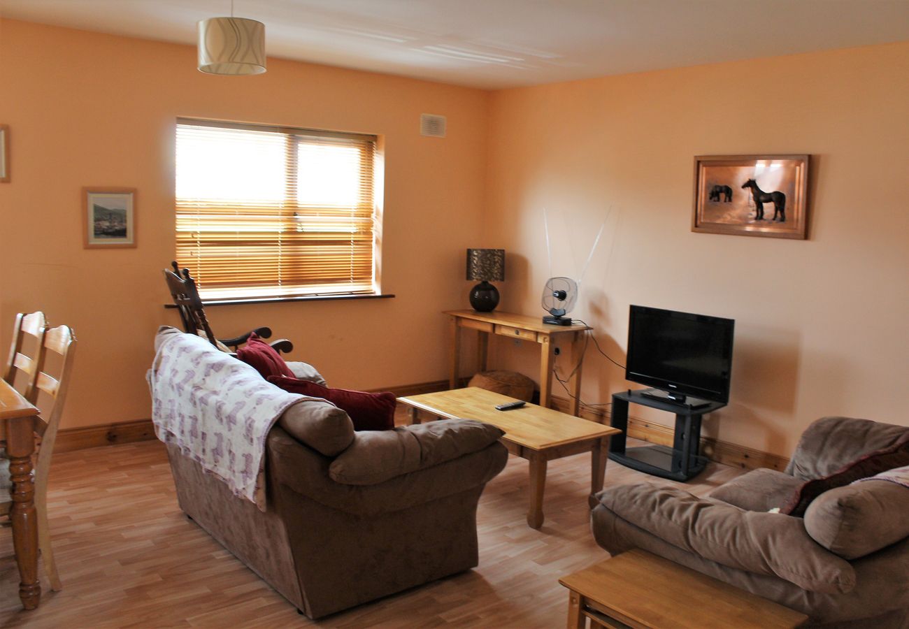 Fairfield Holiday Home, Dingle Co Kerry. Open plan living room, comfortable furnishings with TV