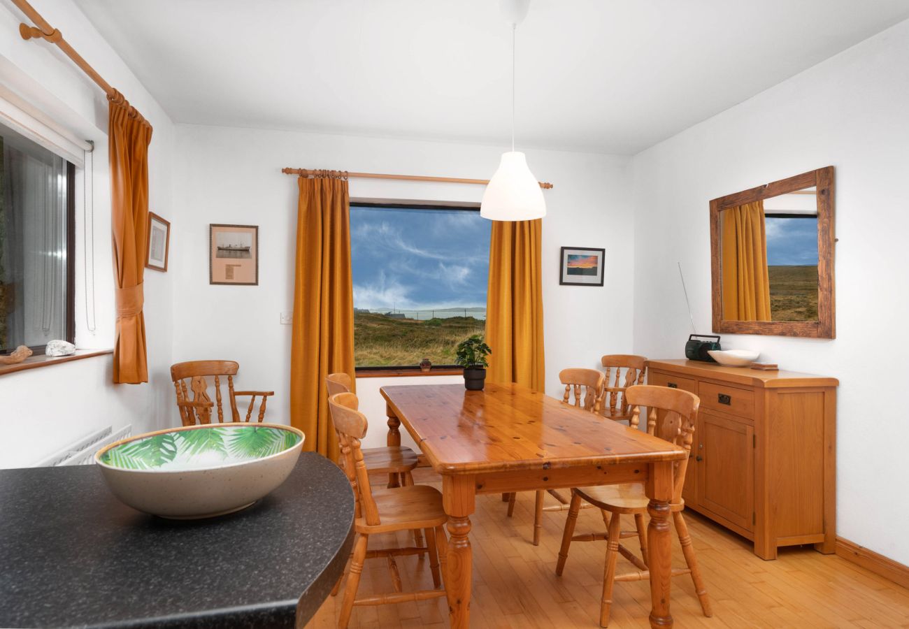 Dining area at Cleggan Stone Cottage in Cleggan, County Galway, Connemara