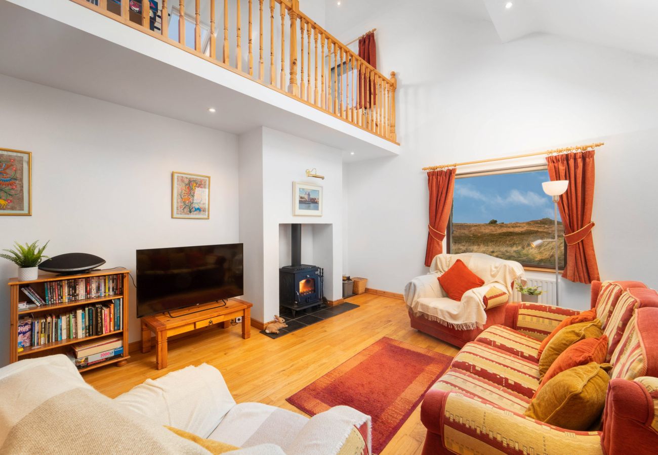 Lounge area at Cleggan Stone Cottage in Cleggan, County Galway, Connemara