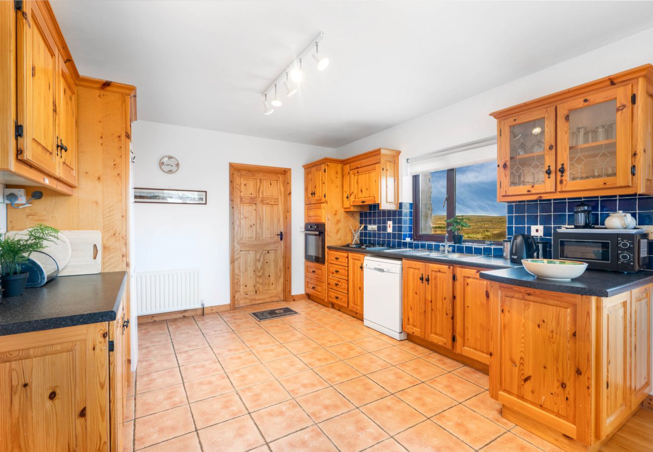 Kitchen area at Cleggan Stone Cottage in Cleggan, County Galway, Connemara