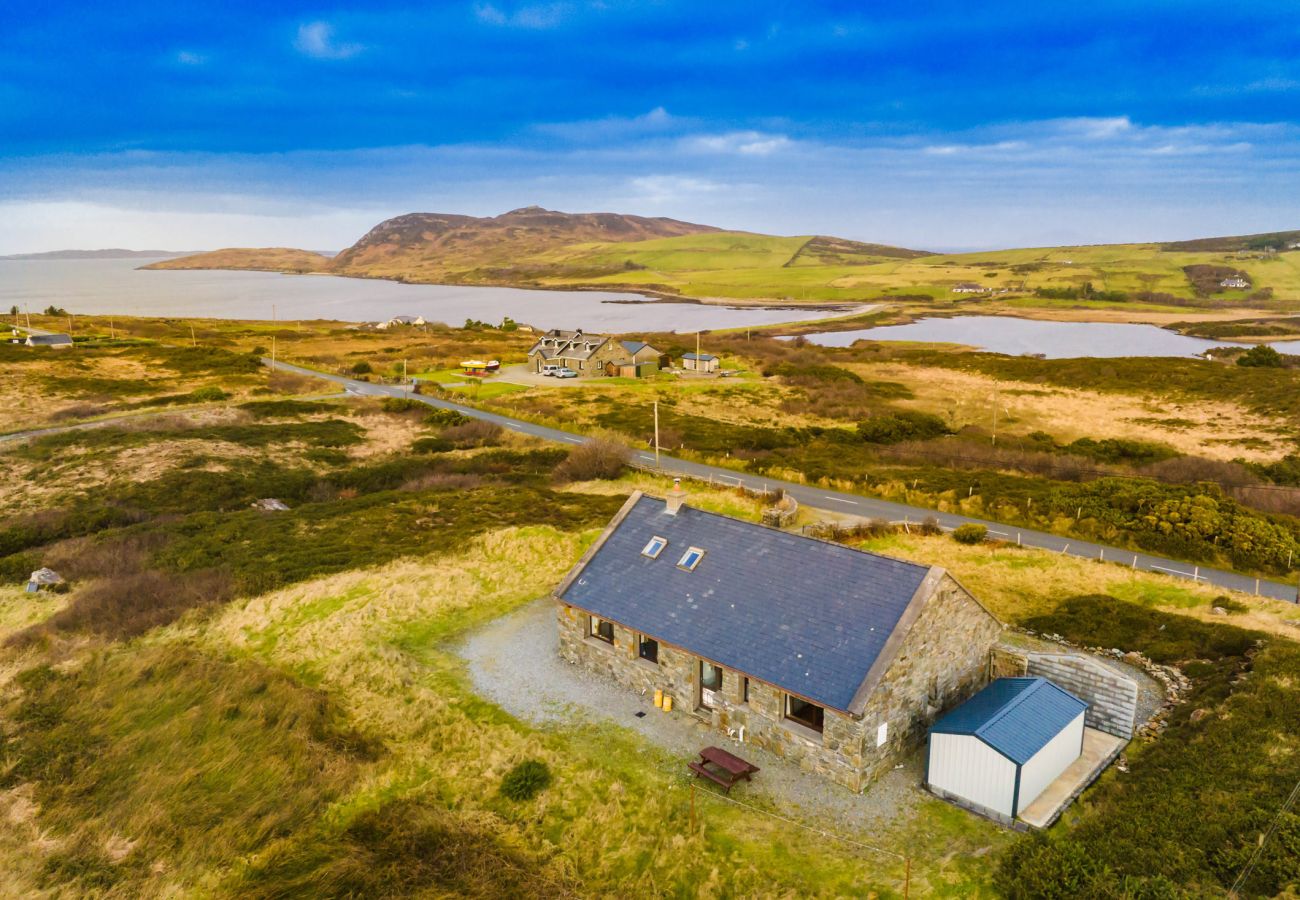 Aerial view of Cleggan Stone Cottage in Cleggan, County Galway, Connemara