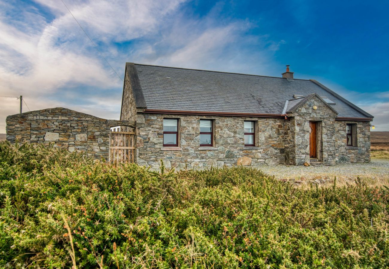 Exterior of Cleggan Stone Cottage in Cleggan, County Galway, Connemara