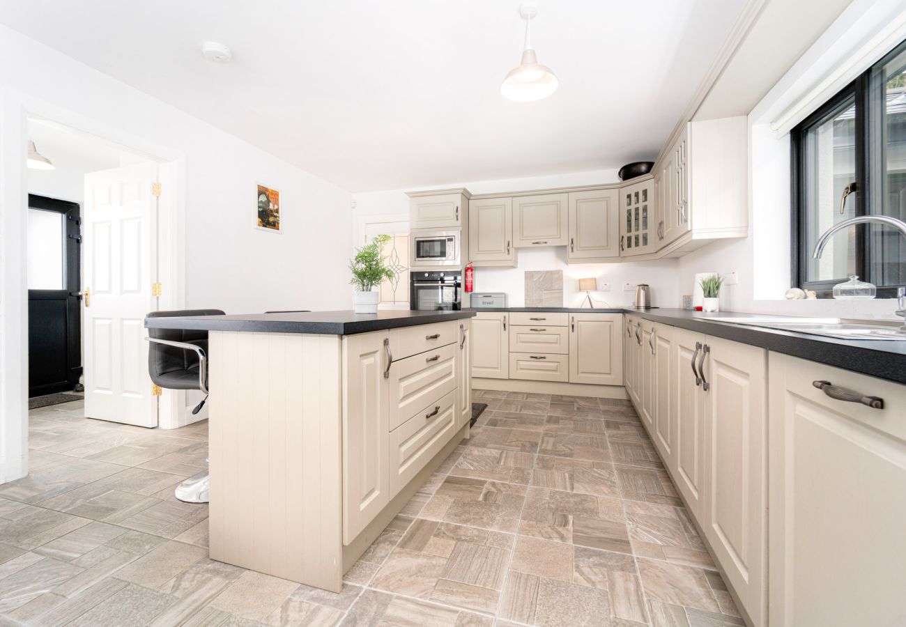 Kitchen area at Oughterard Holiday Cottage in Ougtherard, County Galway, Connemara