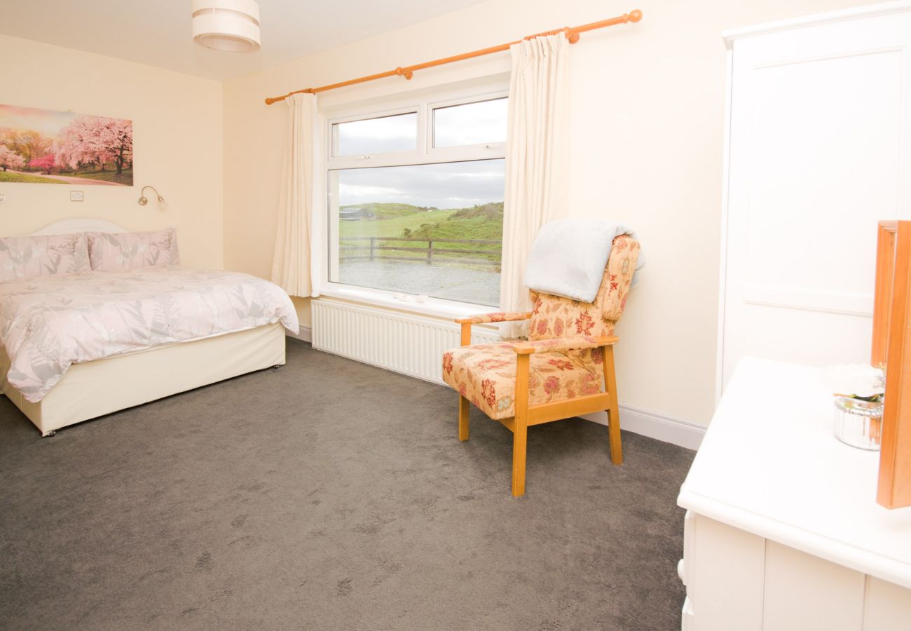 Bedroom of Sky Road Holiday Home located on the scenic Sky Road is a large coastal proeprty sleeping 10, close to the vibrant town of Clifden