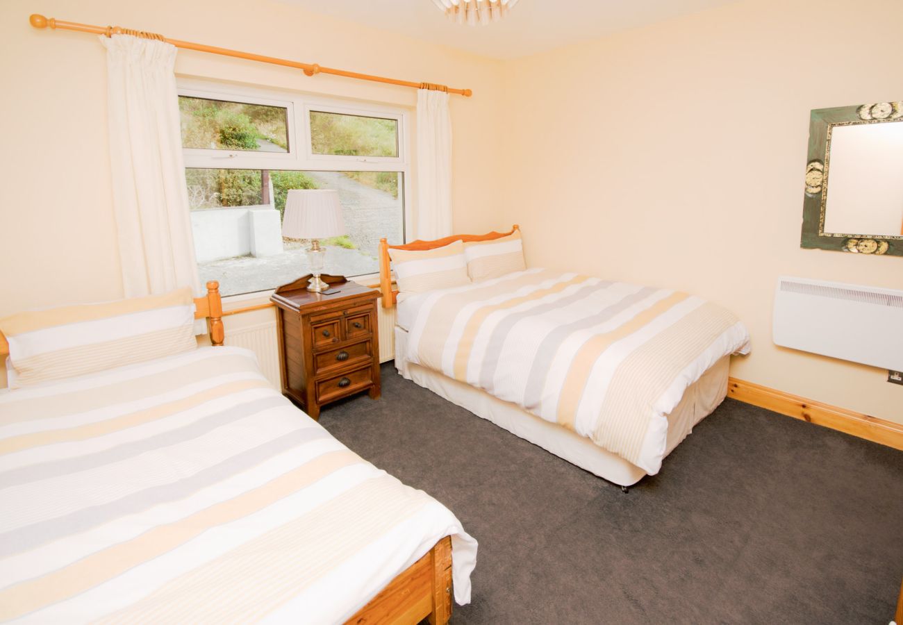 Bedroom of Sky Road Holiday Home located on the scenic Sky Road is a large coastal proeprty sleeping 10, close to the vibrant town of Clifden