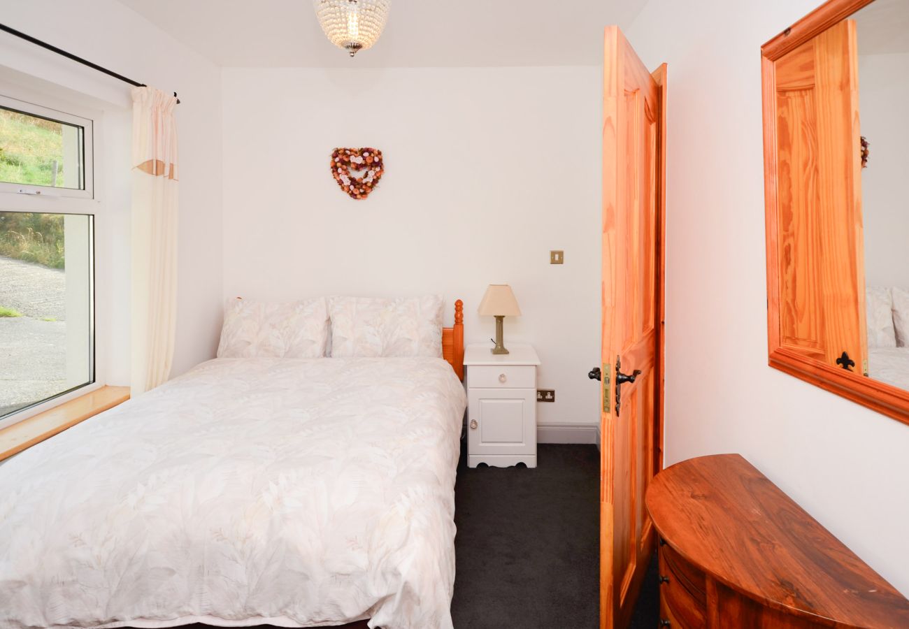 Bedroom of Sky Road Holiday Home located on the scenic Sky Road is a large coastal proeprty sleeping 10, close to the vibrant town of Clifden