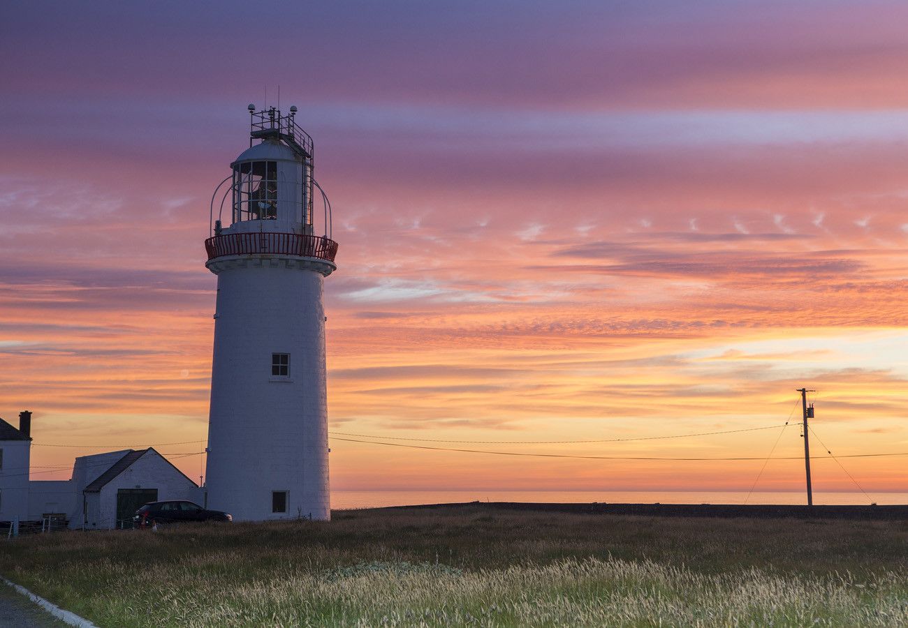 Kilkee Holiday Homes, Seaside Holiday Accommodation, Kilkee, County Clare, Ireland. Loop Head lighthouse.