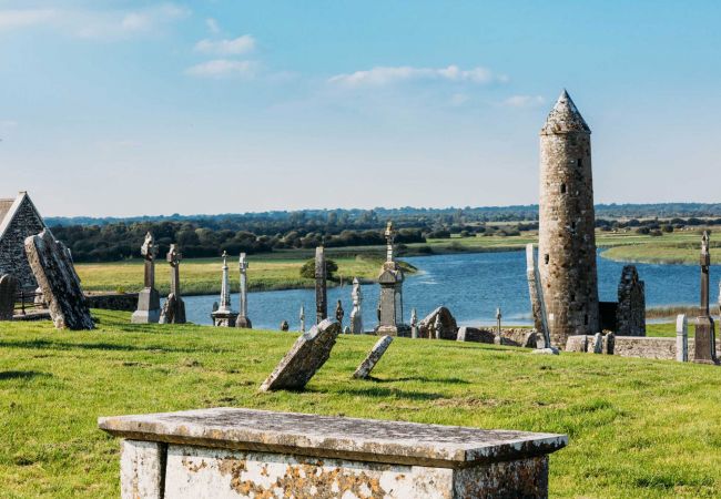 Clonmacnoise Graveyard and Round Tower, County Offaly © Failte Ireland