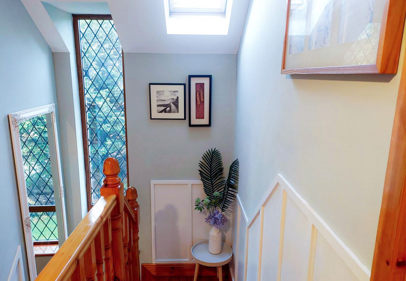 Stairwell with Large Window and Garden Views Knockmanagh Holiday Home