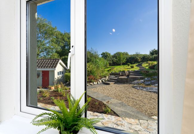 Views of the garden at Clifden Countryside Holiday Home