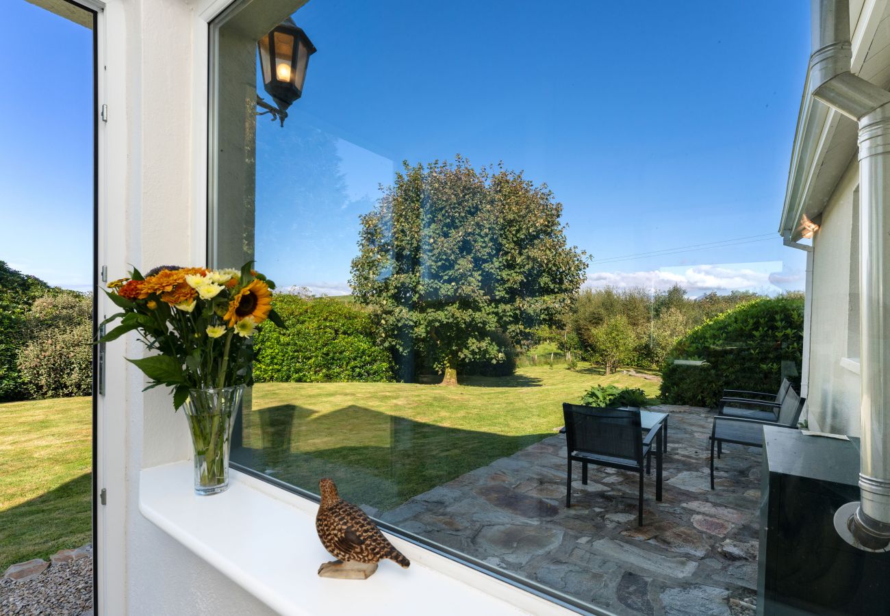 Patio area in garden at Clifden Countryside Holiday Home