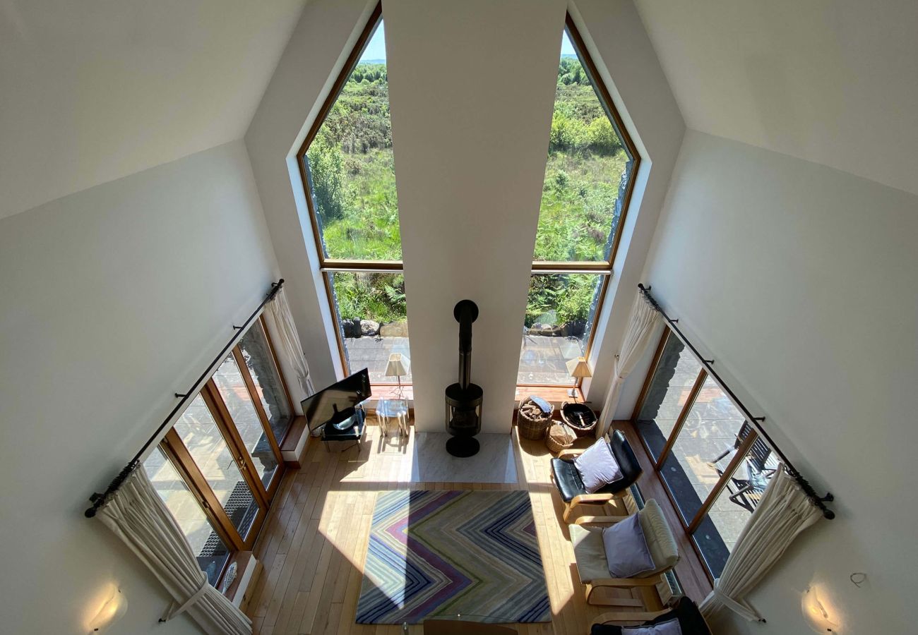 View of the living room from the mezzanine at Lough Corrib Luxury Holiday Home