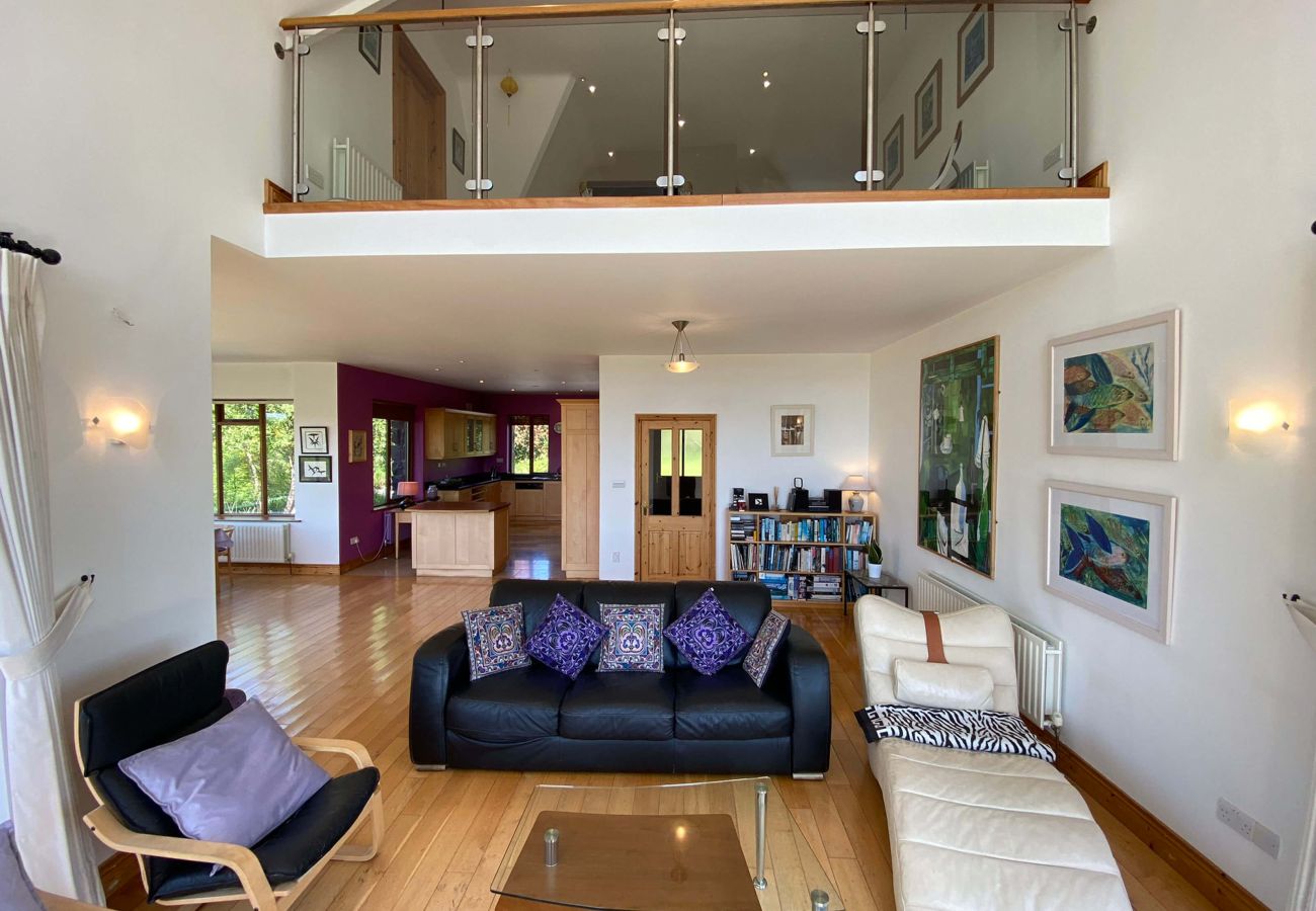 View of mezzanine from living and patio in Lough Corrib Luxury Holiday Home