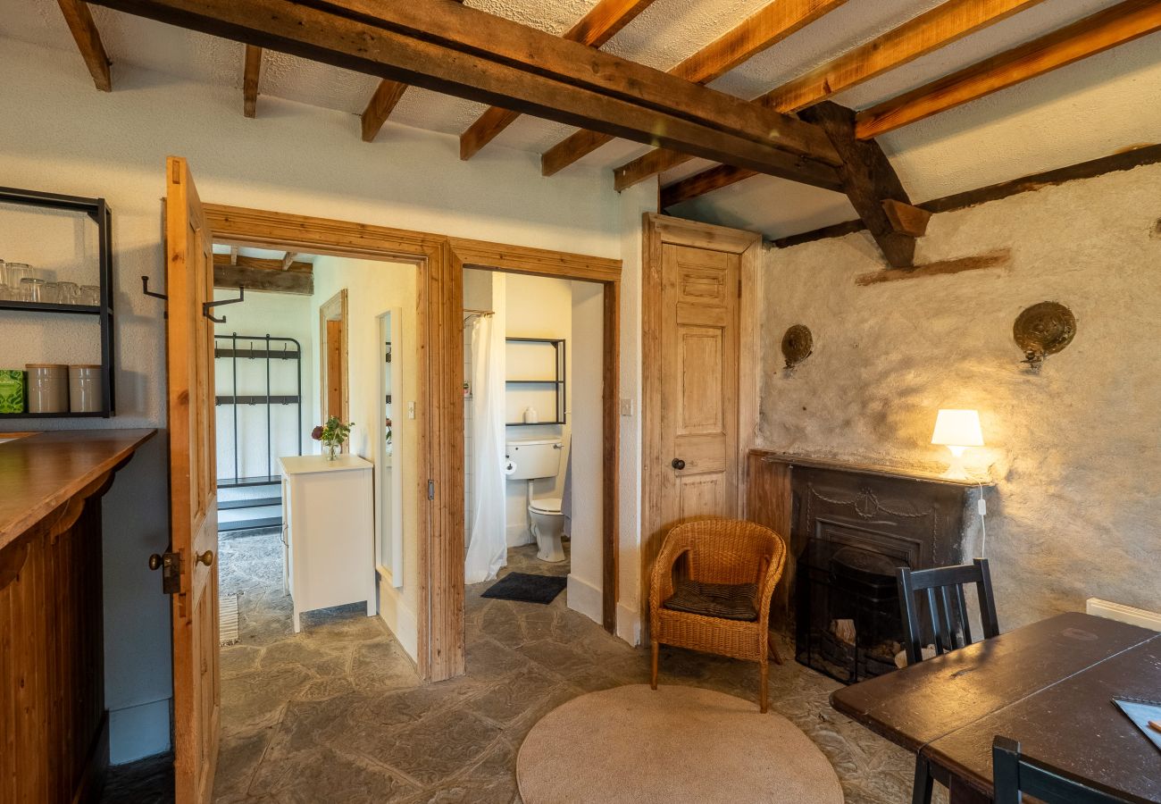 Seating by the wood burning stove Ventry Farm Seaside Cottage