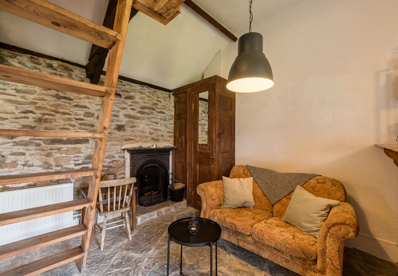 Seating Area with Open fire Ventry Farm Shamrock Cottage