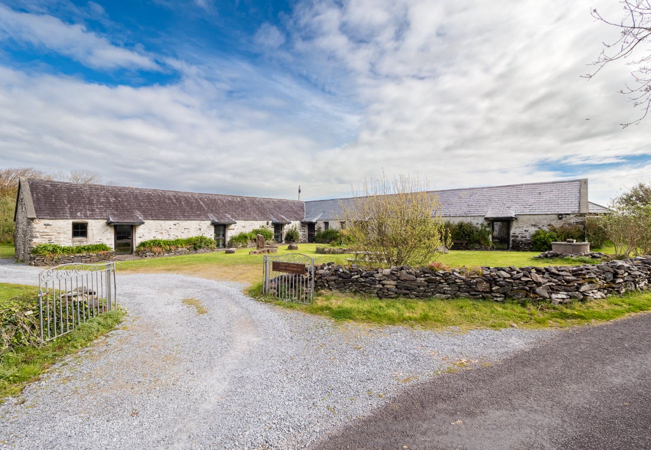 Exterior view of Ventry Farm Cottages - a cluster of rustic and charming accommodation available on Dingle Peninsula, County Kerry