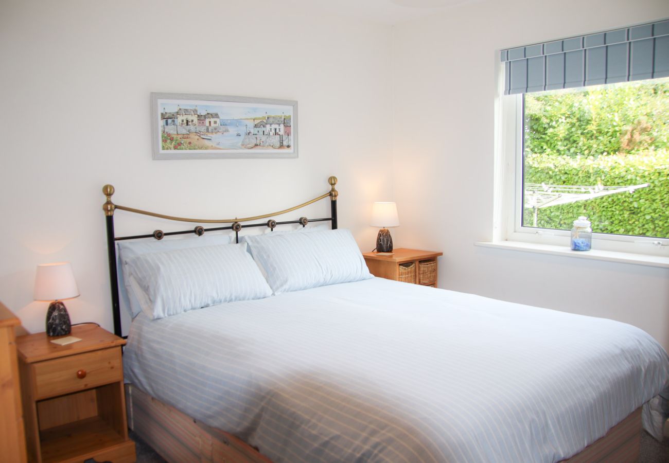 Bright spacious double room with a garden view. Dunmore Villas Holiday Home No 1. Seaside family friendly home. 