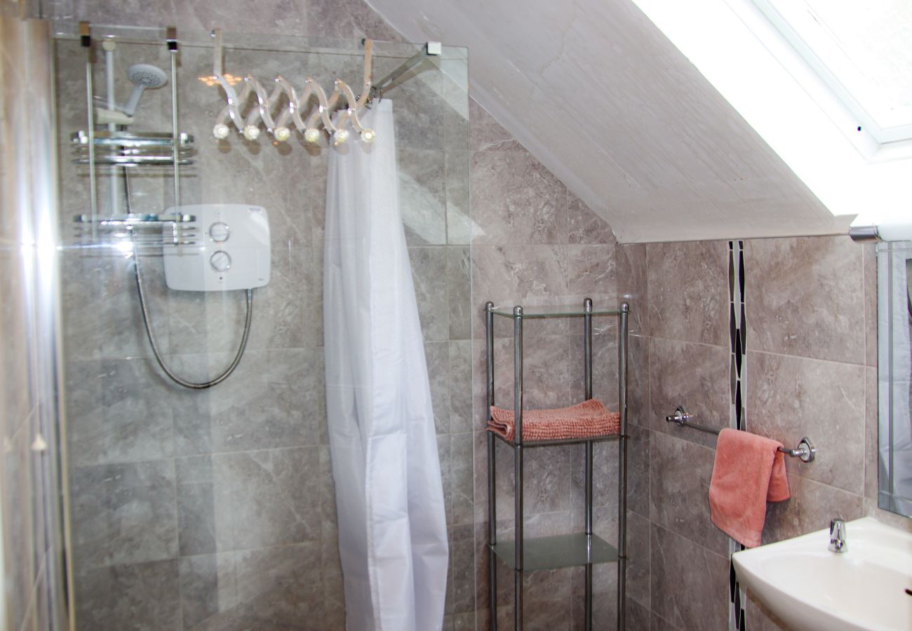   Contemporary tiled stylish bathroom in Dunmore Villas Holiday Home No 1. Dunmore East.