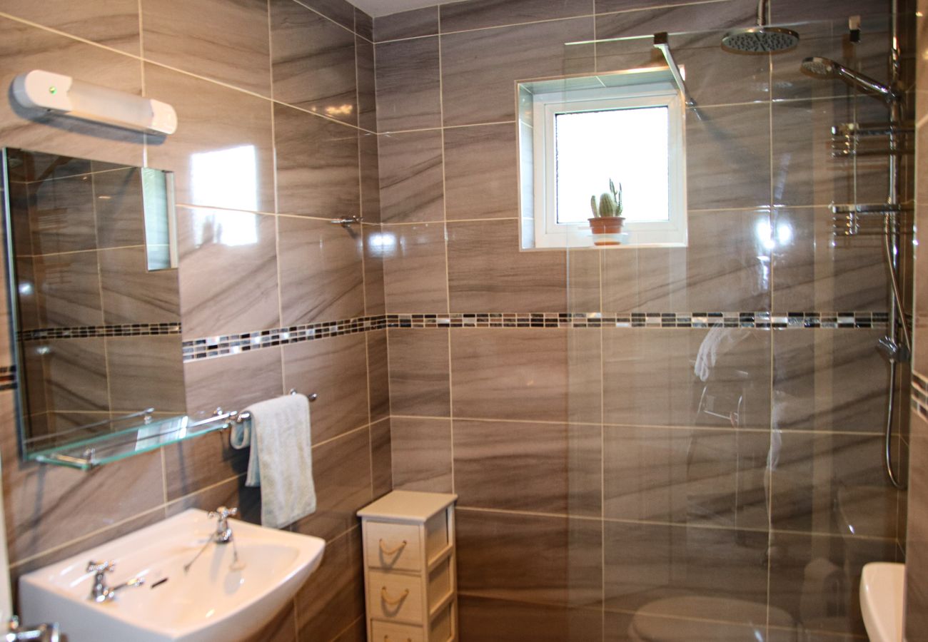   Contemporary stylish tiled bathroom in Dunmore Villas Holiday Home No 1 