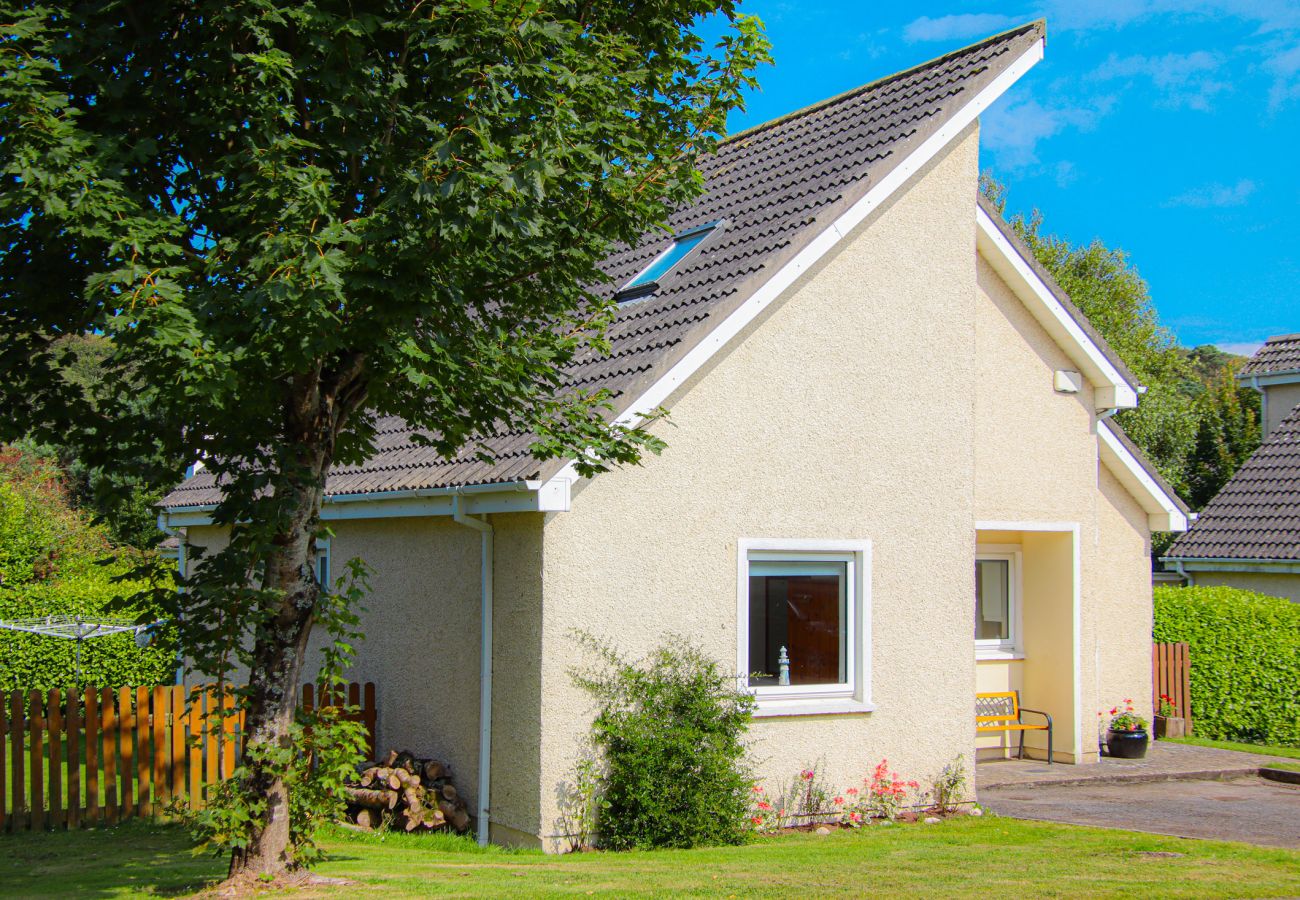 Exterior of Dunmore Villas Holiday No 1.  Seaside family friendly home in Dunmore East, Co. Waterford. Seating outside, sunny well maintained gar