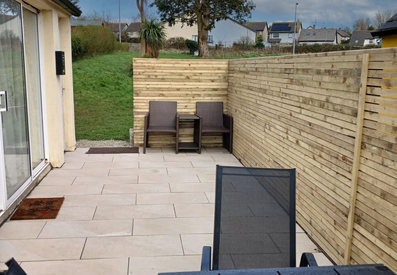 Private patio, dining, sunny seating, access to green play area for kids. Seamount Holiday Village No.26. Seaside Holiday Home Available near Courtown