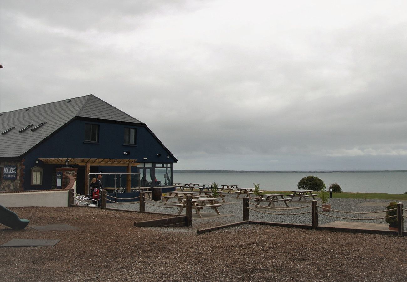 Seacliff Holiday Home No. 12, Dunmore East, County Waterford. Picnic tables, sea view. 