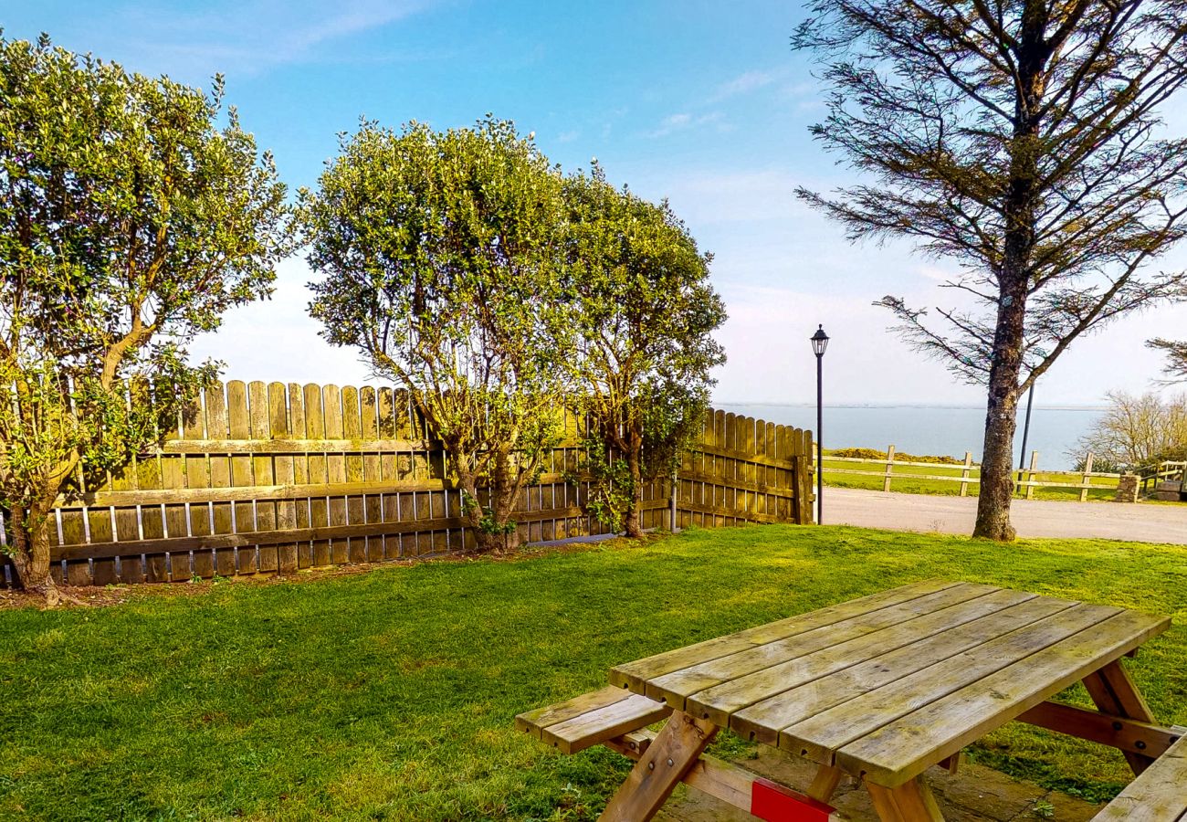 Seacliff Holiday Home No. 12, Dunmore East, County Waterford. Outside dining, garden.