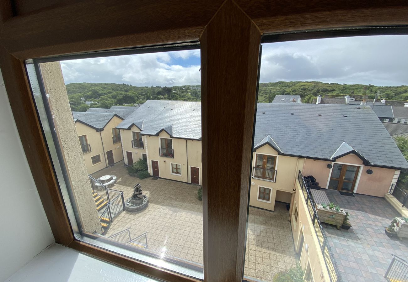 Clifden Town Holiday Apartment. Aerial views from apartment to courtyard.