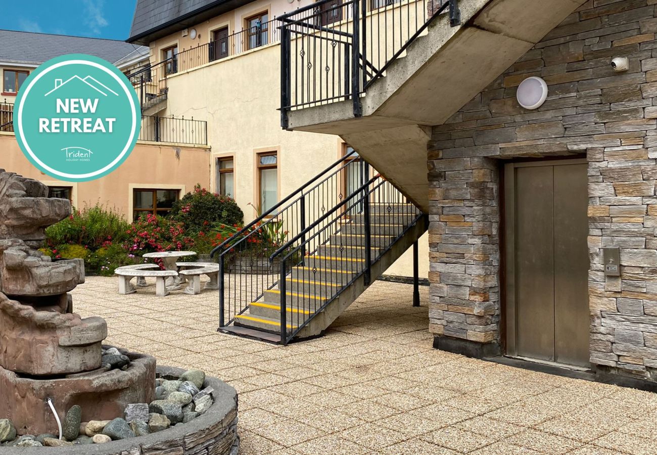 Clifden Town Holiday Apartment. Clifden, Co. Galway.  Stairwell to outside patio.