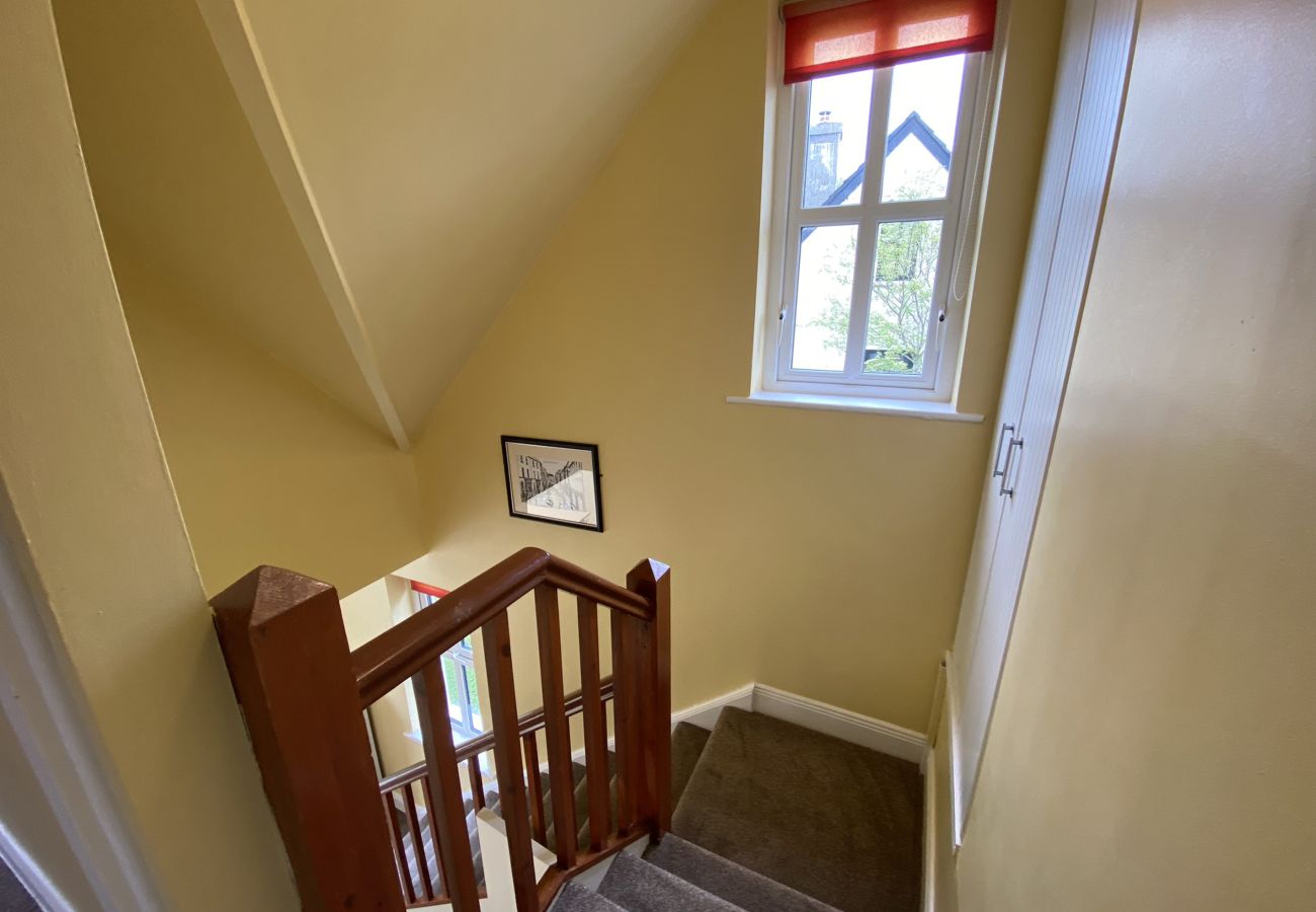 Clifden Glen Holiday Village No 11. Clifden Co Galway. Two floors, stairs with window. 