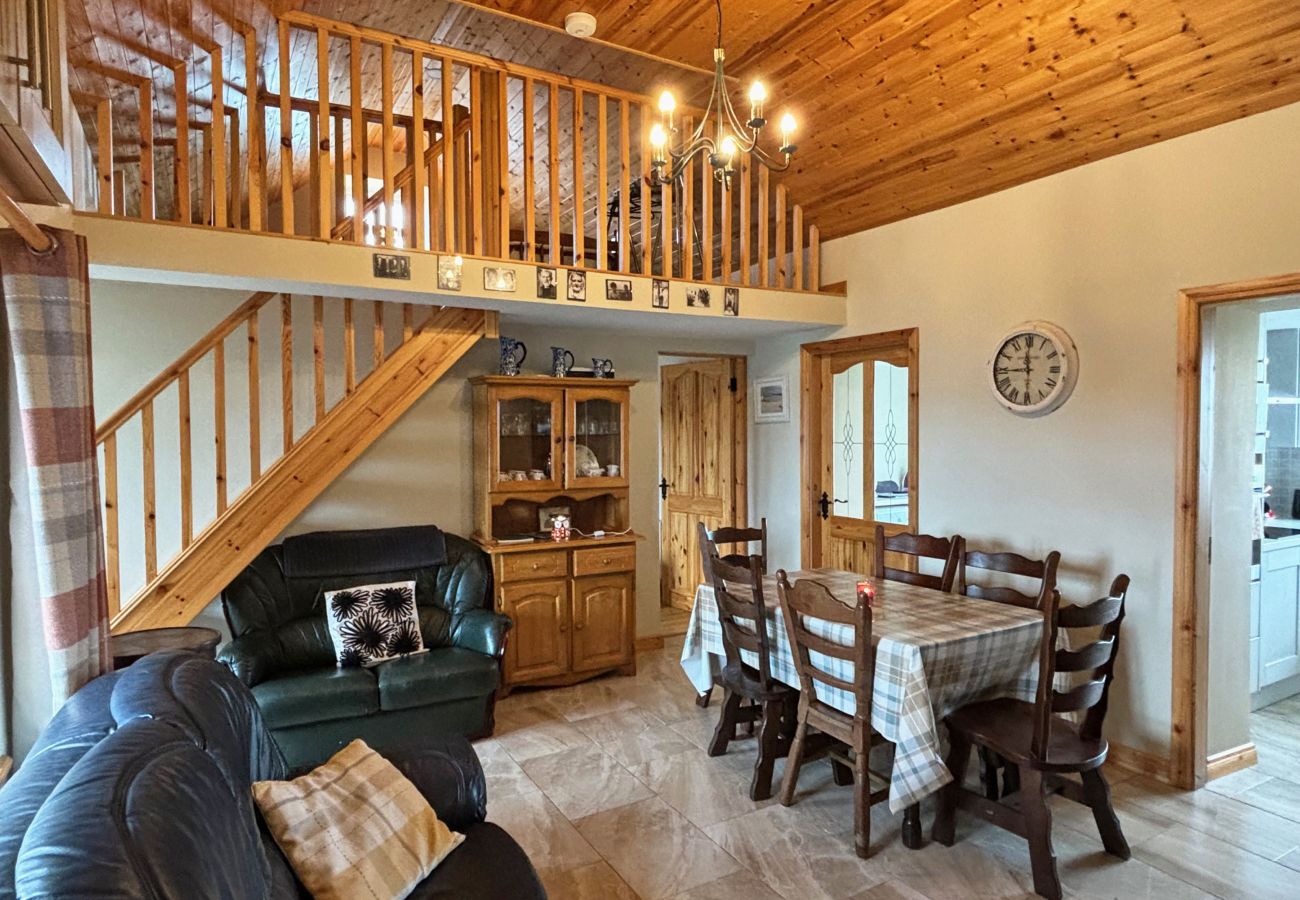 Conroy's Cottage Carna. Mezzanine. Dining for 6. Mezzanine with stairs, open plan dining lounge. 