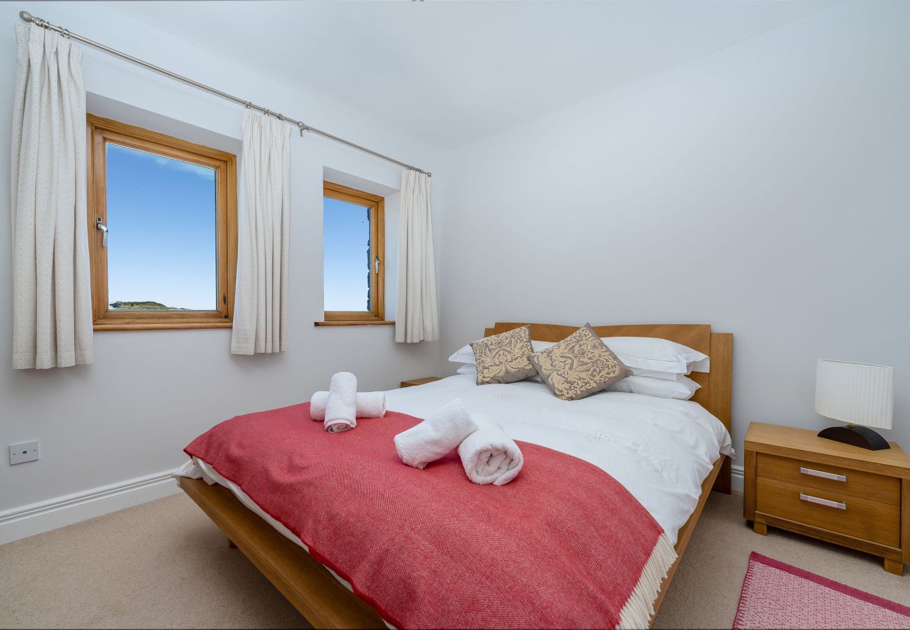 Ocean View Holiday Home. King size bed, modern furniture, bedside locker. Bright.