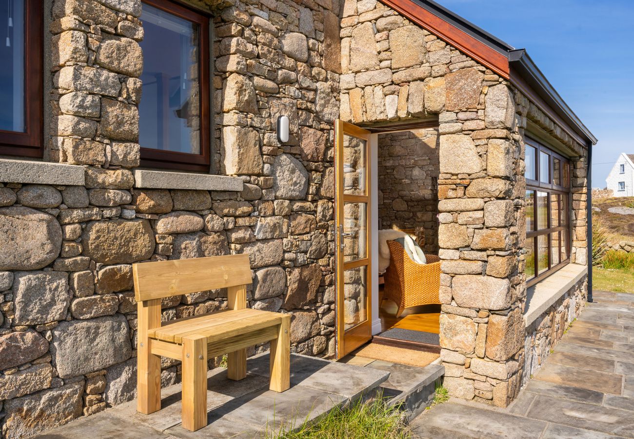 Ocean View Holiday Home. Spectacular views to the countryside and ocean. Traditional stone house. Outdoor seating. 