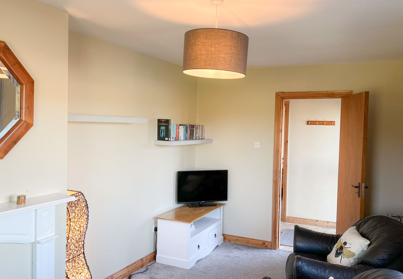 Honeybee Cottage Valentia Co Kerry. Cosy living room. TV