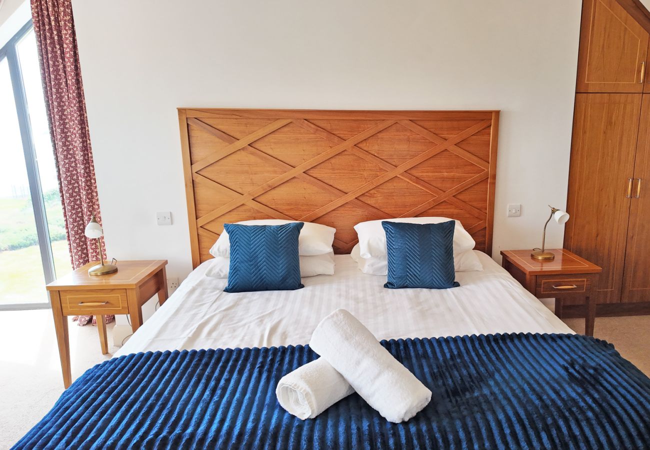 Derrynane Oceancove Holiday Homes Co Kerry. Family holiday accommodation. Double room bright contemporary furnishing.