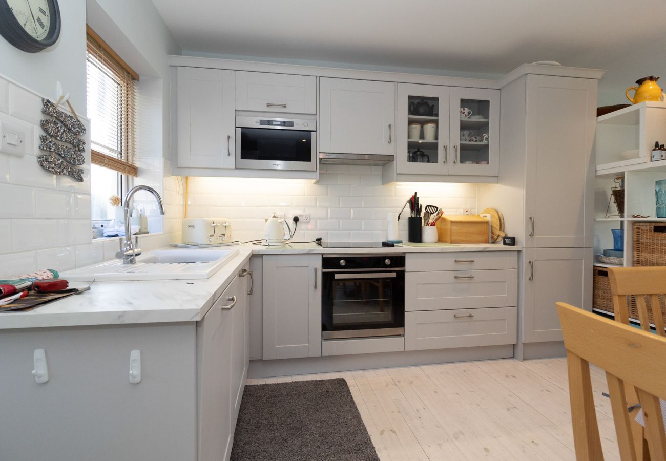 Brittas Bay Holiday Park No 7. Family holiday home. Modern bright fitted kitchen.