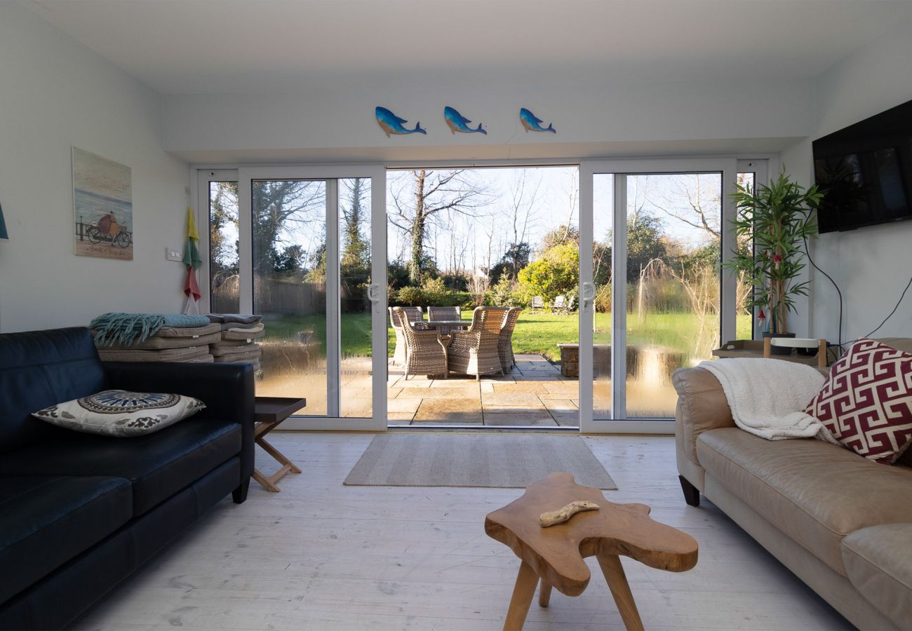 Brittas Bay Holiday Park No 7. Living Room, patio door to large garden. Modern furnishing. 