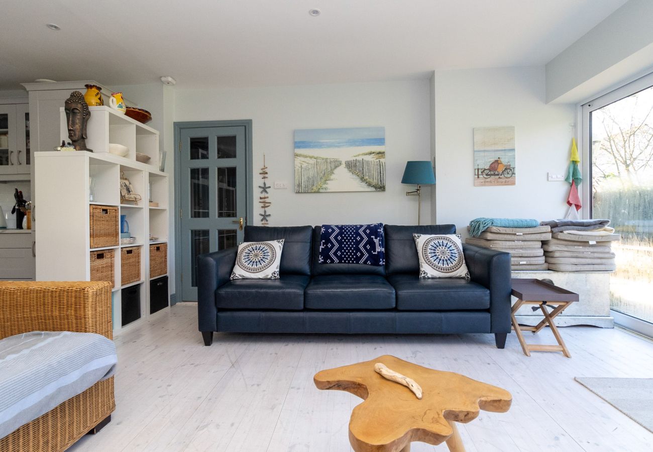 Brittas Bay Holiday Park No 7. Living room, bright, large patio doors modern furnishings. 