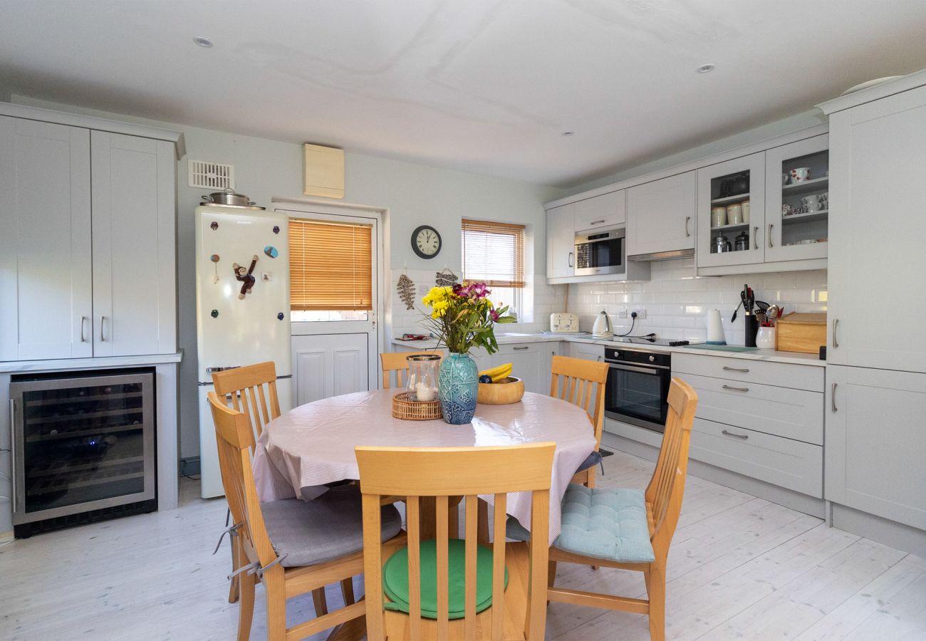 Brittas Bay Holiday Park No 7. Family holiday home. Modern bright fitted kitchen. Dining table for 6. 