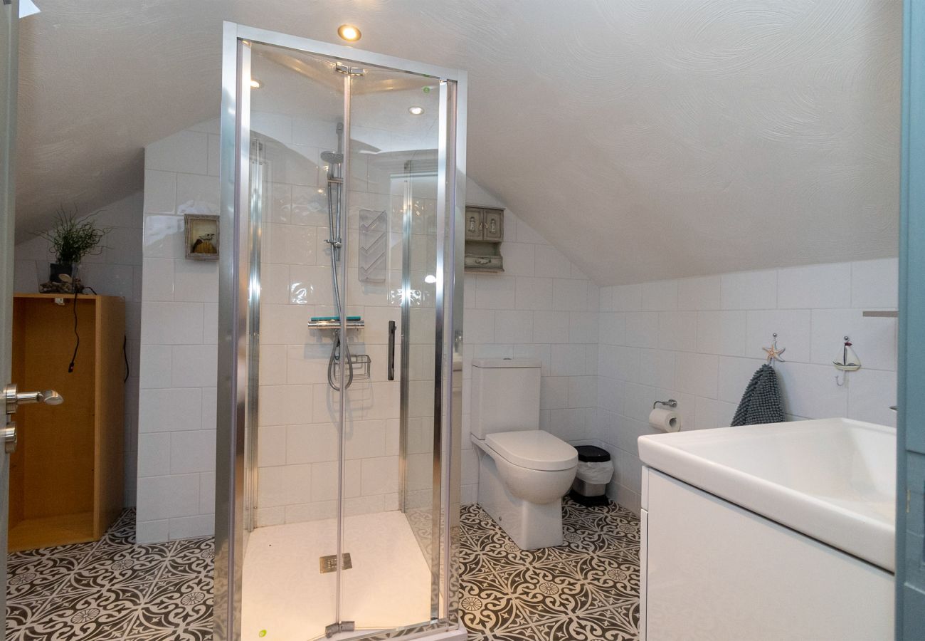 Brittas Bay Holiday Park No 7.  Modern bathroom, bath, sink, wc walk in shower. 