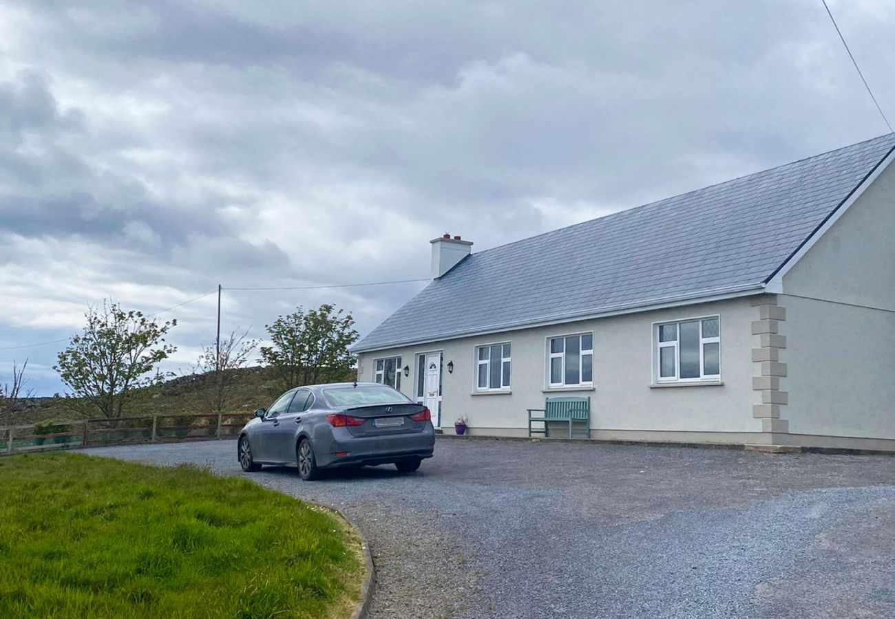Kilkieran Holiday Home Connemara. Exterior with views to sea. 