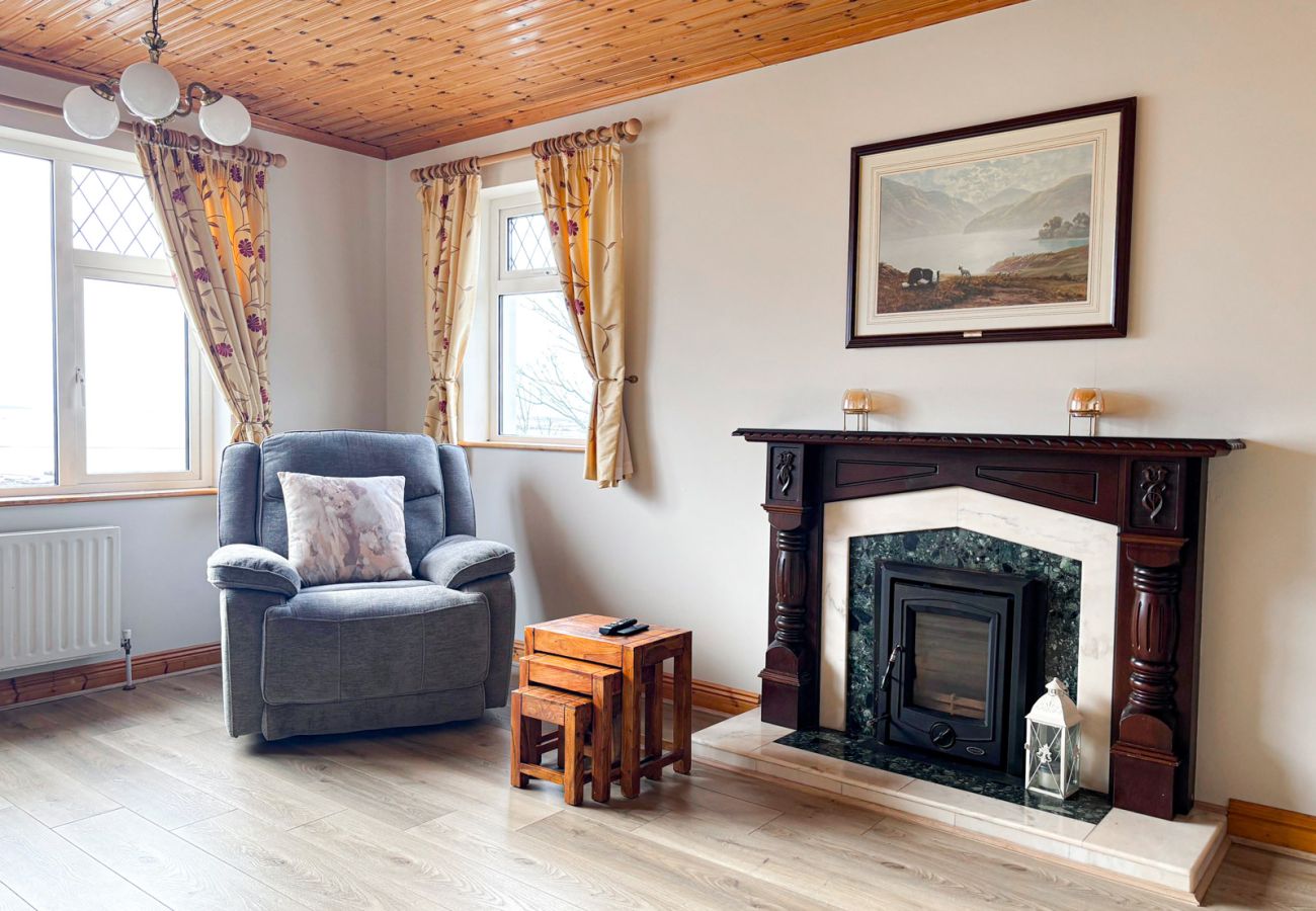 Kilkieran Holiday Home Connemara, comfortable living room, solid fuel panoramic views.
