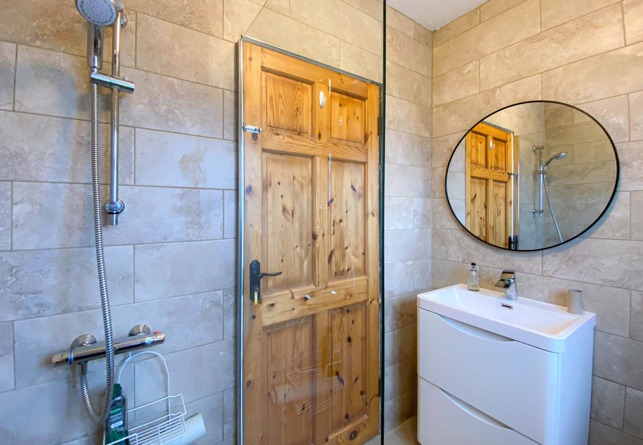  Renvyle Holiday Home Connemara.  Modern tiled bathroom, walk in shower, contemporary fittings. 