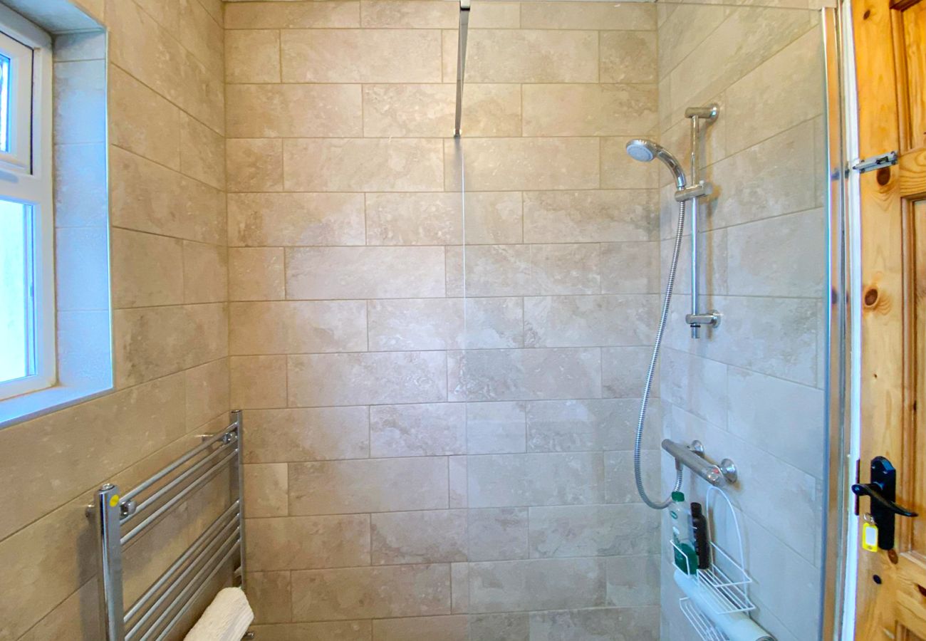  Renvyle Holiday Home Connemara.  Modern tiled bathroom, walk in shower, contemporary fittings. 