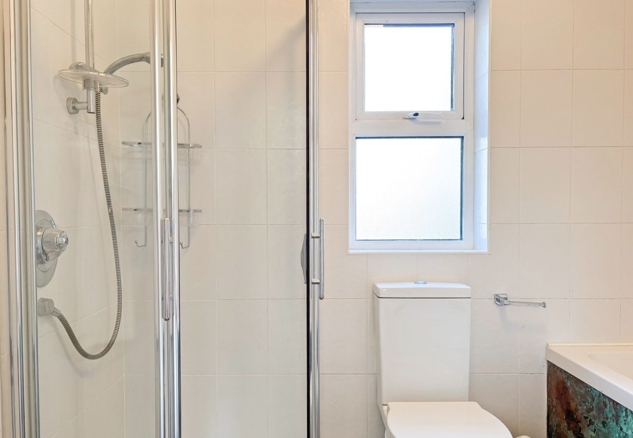 Moyard Stone Cottage, Connemara.  Bathroom, bath, sink. WC, shower