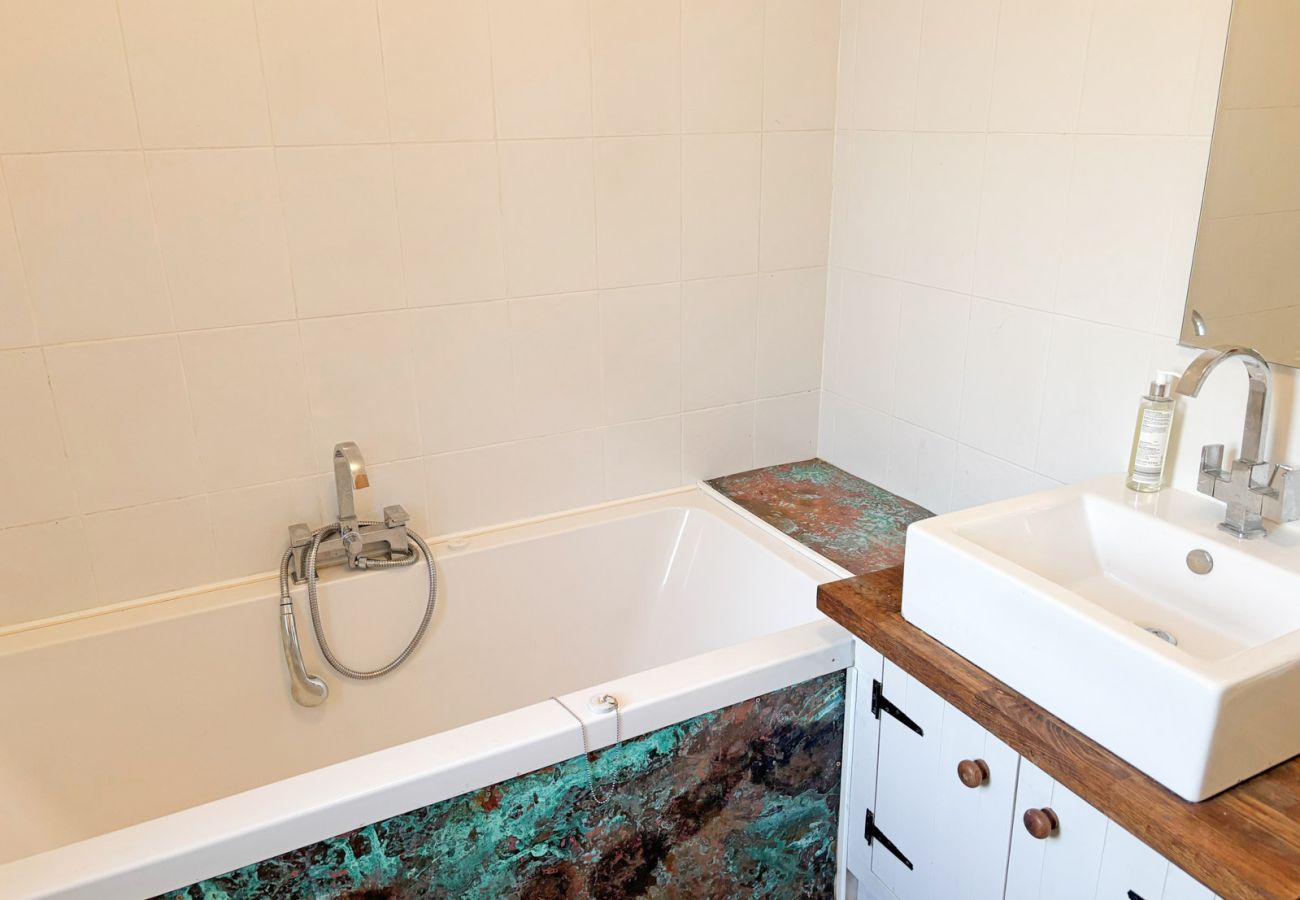 Moyard Stone Cottage, Connemara.  Bathroom, bath, sink. tasteful design. 